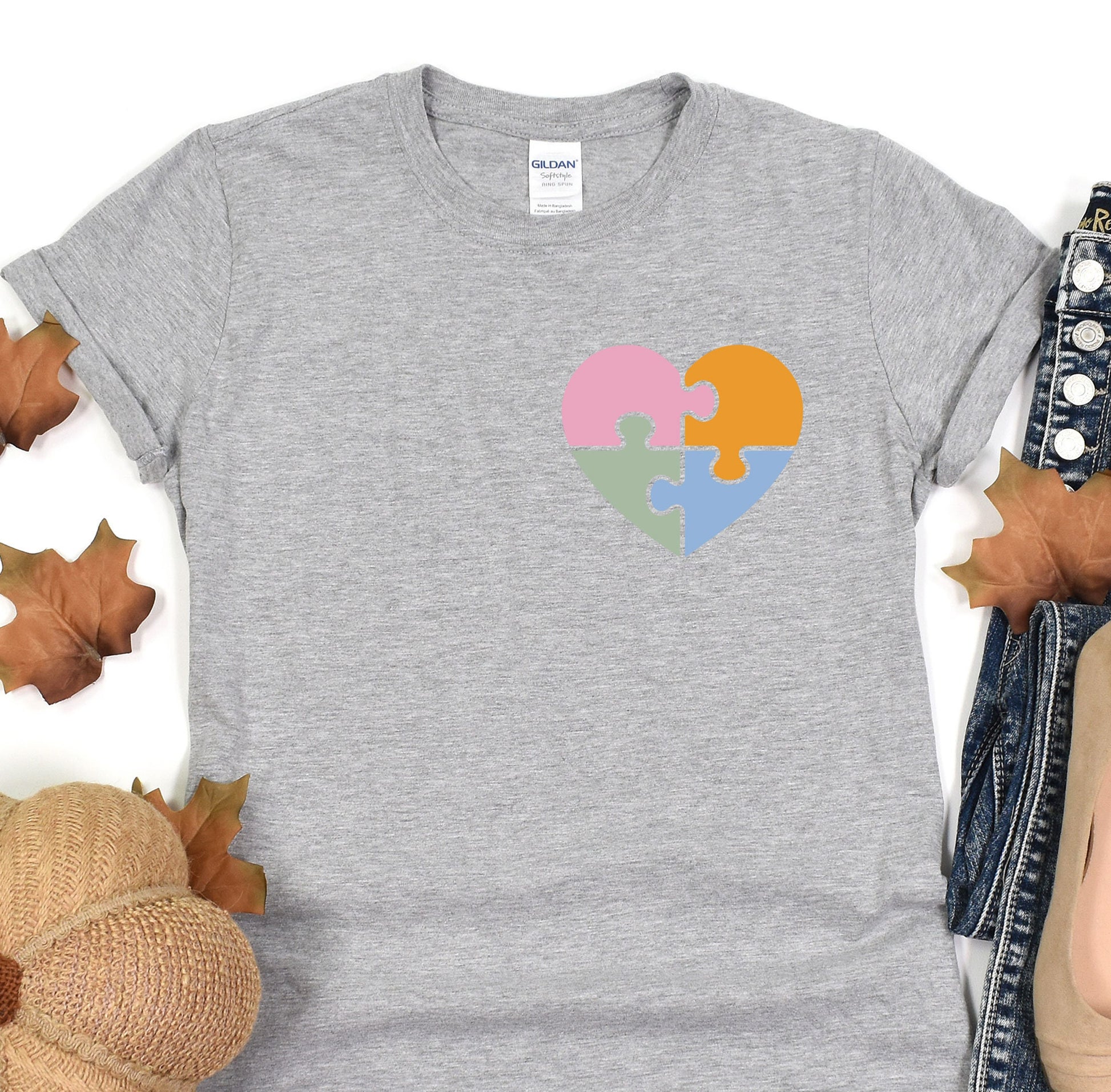 a t - shirt with a puzzle heart on it