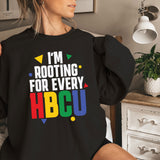 a woman sitting on a bed wearing a black shirt that says i'm root