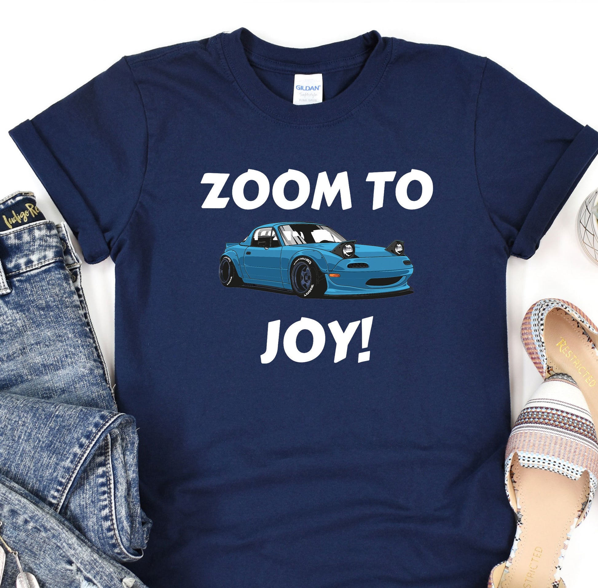 a t - shirt that says zoom to joy with a car on it