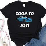 a black shirt with a blue car and the words zoom to joy on it