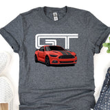 a t - shirt with a picture of a red mustang on it