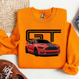 an orange sweatshirt with a picture of a car on it