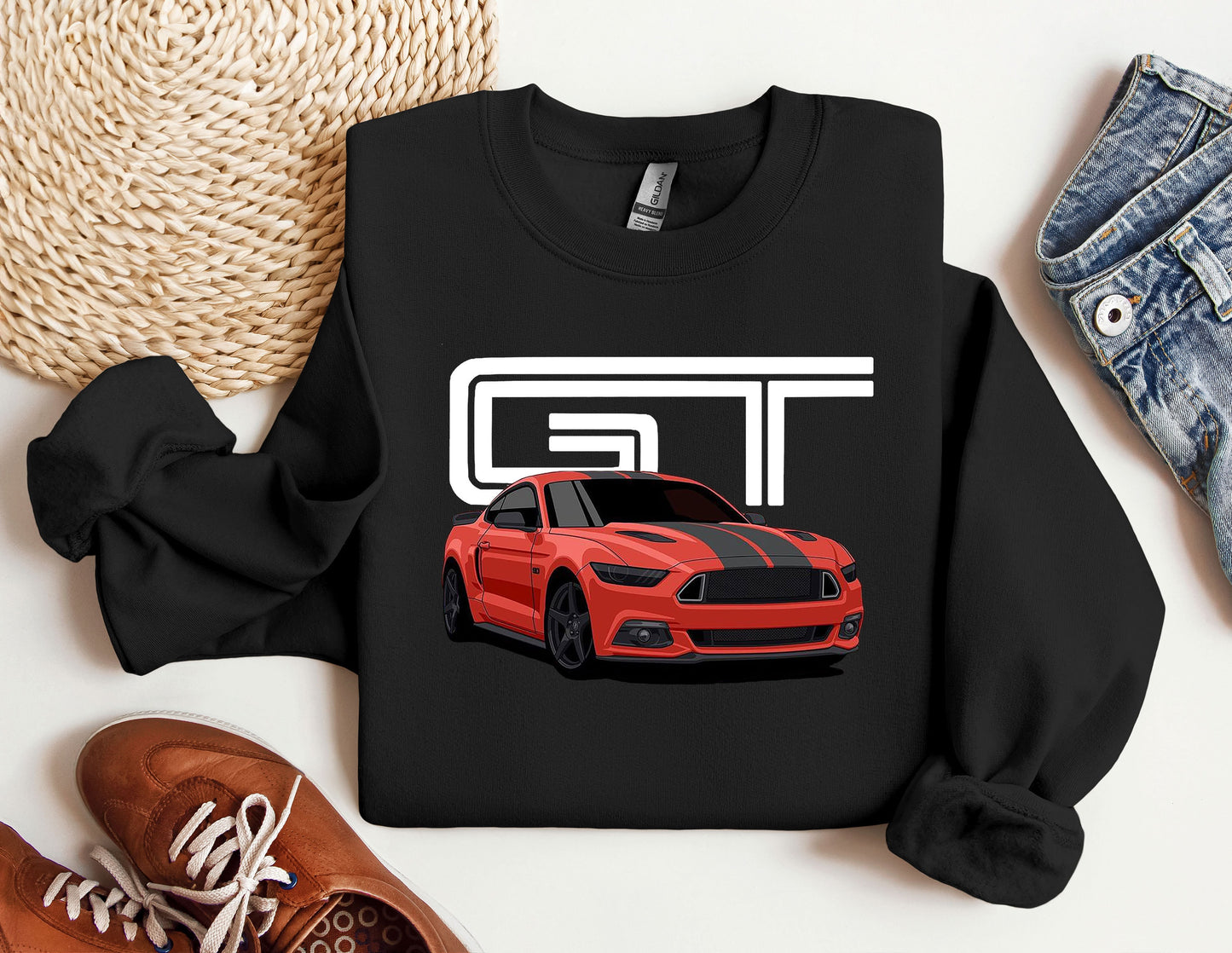 a black sweatshirt with a red mustang on it