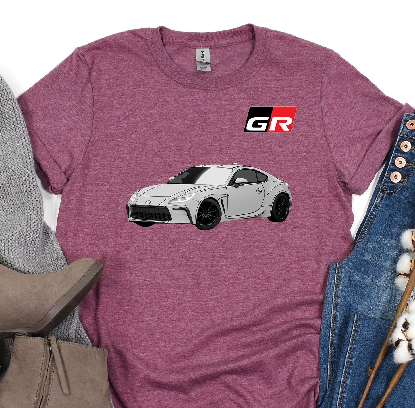 a t - shirt with a picture of a car on it