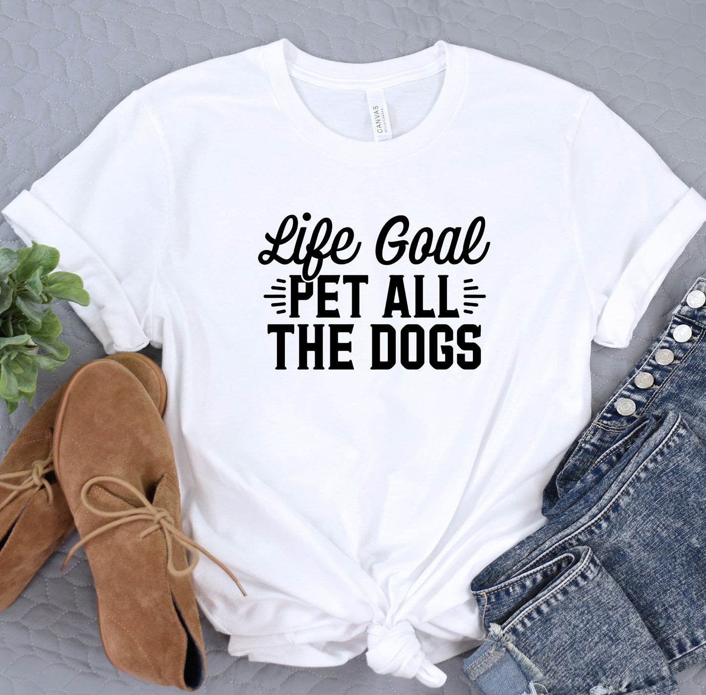 a white shirt that says life goal pet all the dogs