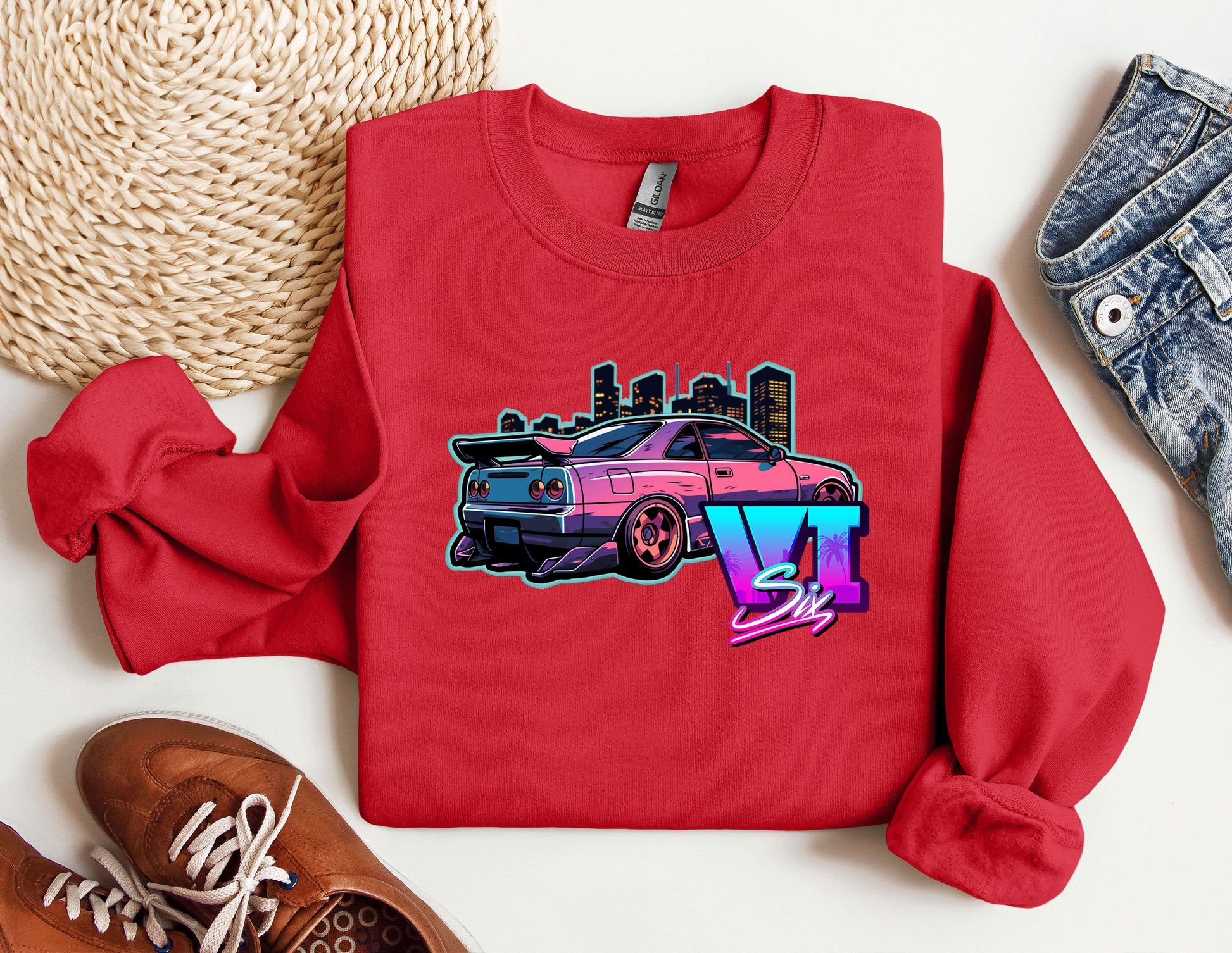 a red shirt with a pink car on it
