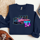 a blue shirt with a pink car on it