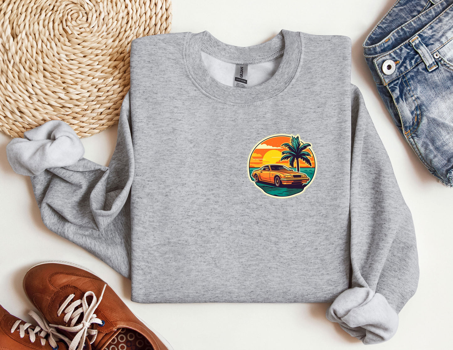 a grey sweatshirt with a palm tree on it