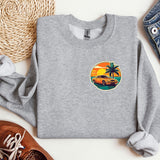 a grey sweatshirt with a palm tree on it