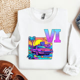 a white sweatshirt with a v v on it next to a pair of shoes