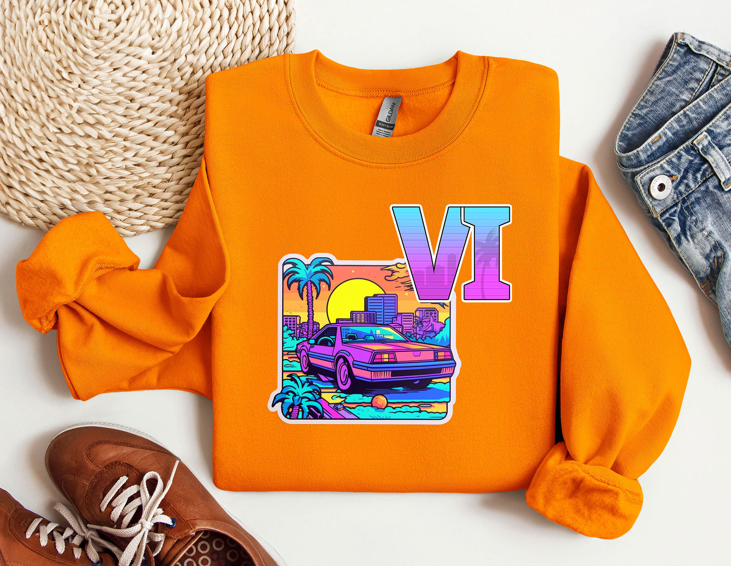 an orange sweatshirt with the letter v on it