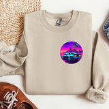 a sweater with a picture of a car and palm trees on it