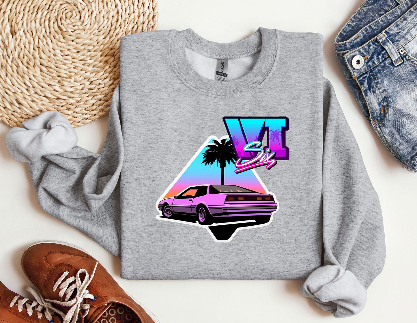 a t - shirt with a picture of a car and a palm tree