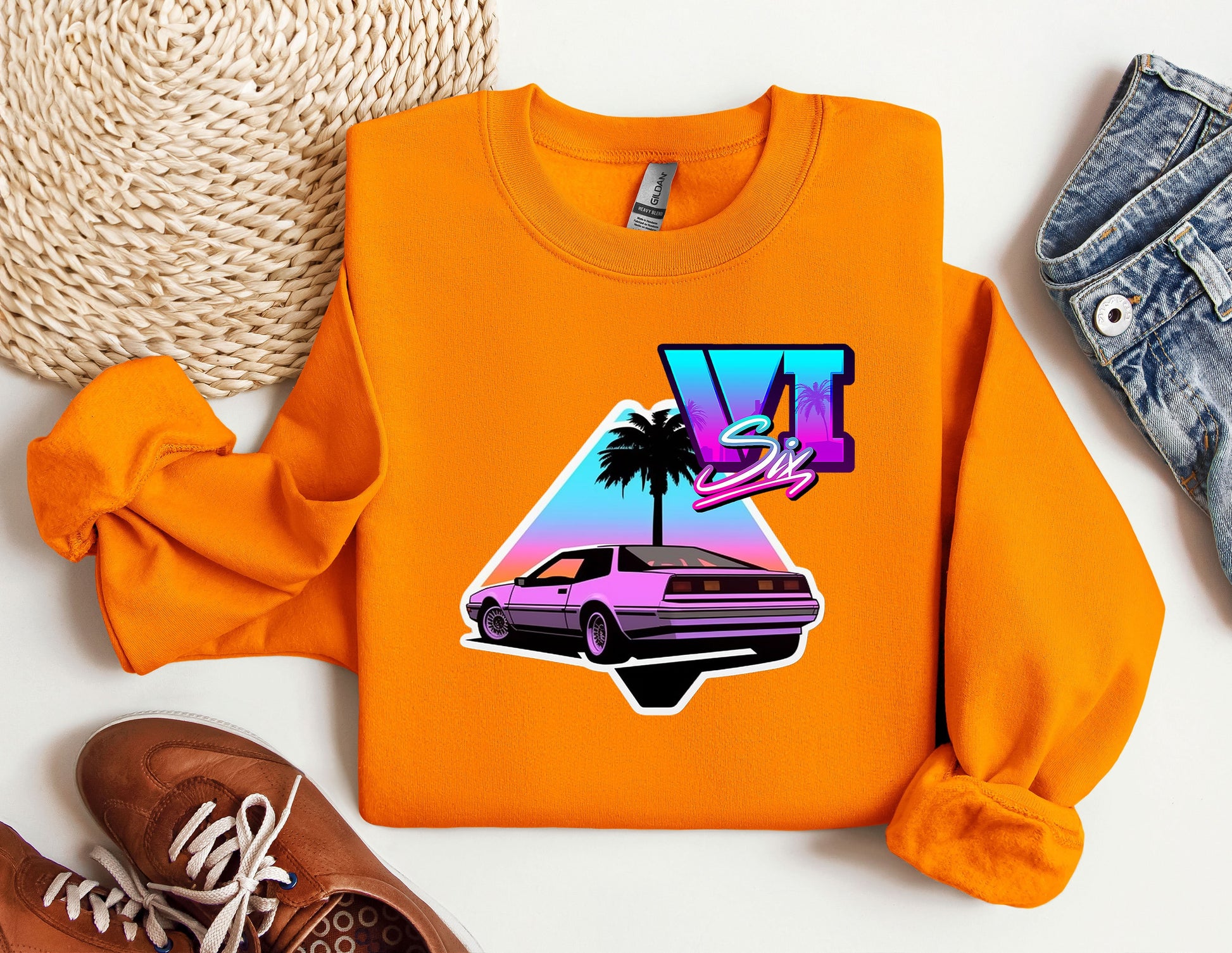 an orange shirt with a picture of a car on it