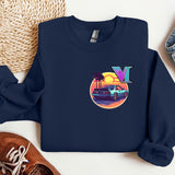 a blue sweatshirt with a picture of a vw bus on it