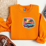 an orange sweatshirt with a picture of a car on it