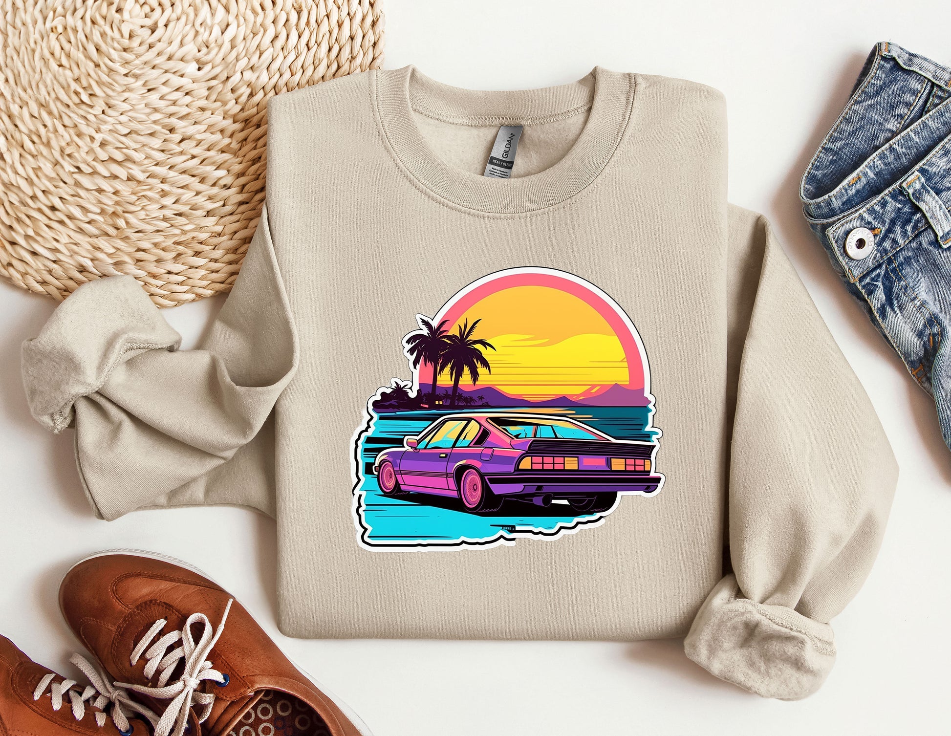 a sweater with a picture of a car on it