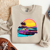 a sweater with a picture of a car on it
