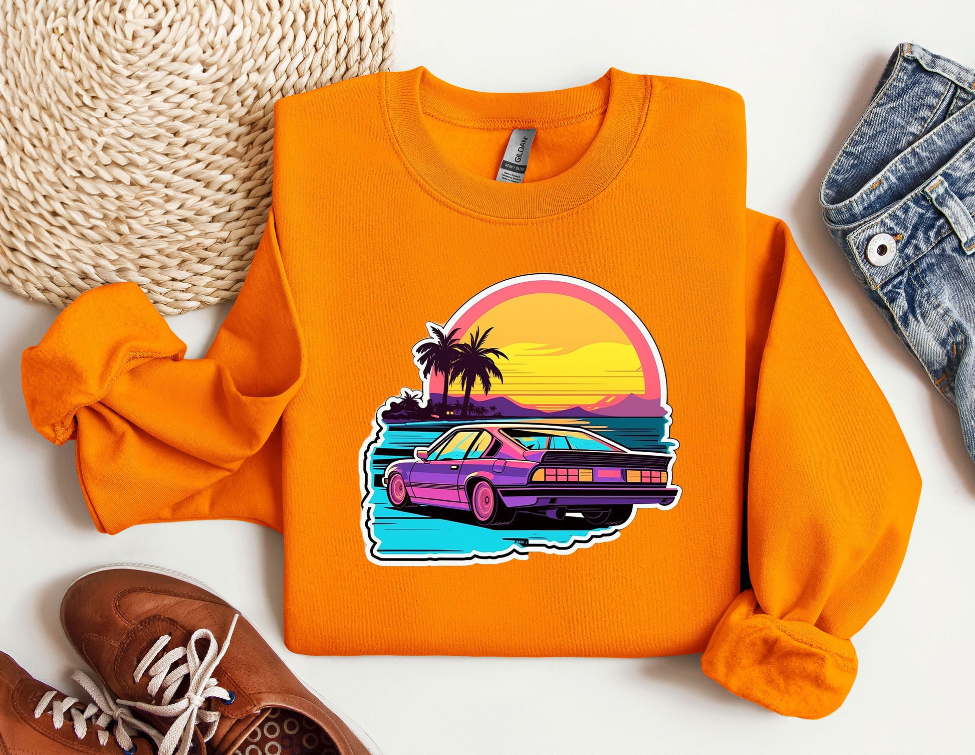 an orange shirt with a picture of a car on it