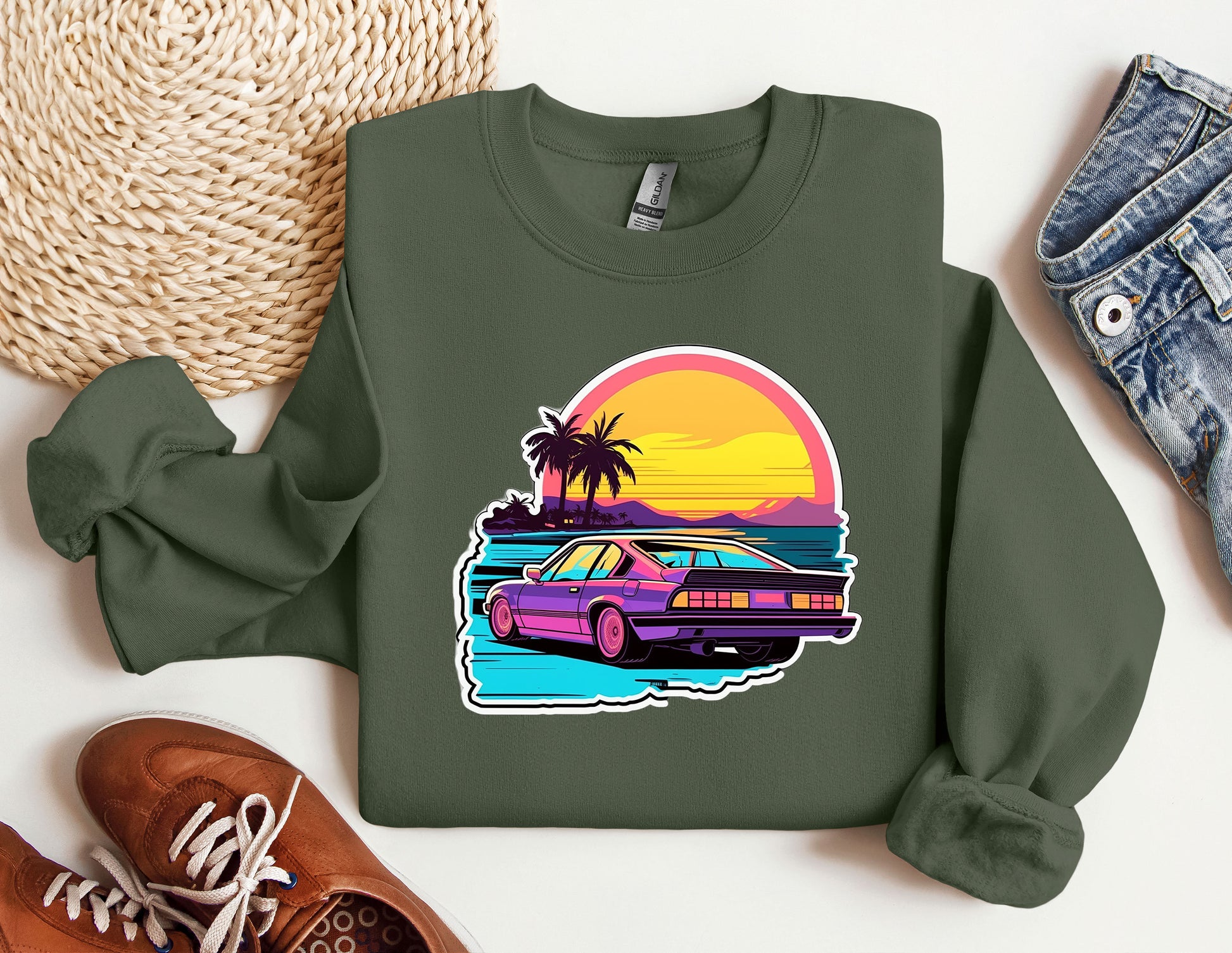 a green sweatshirt with a picture of a car on it