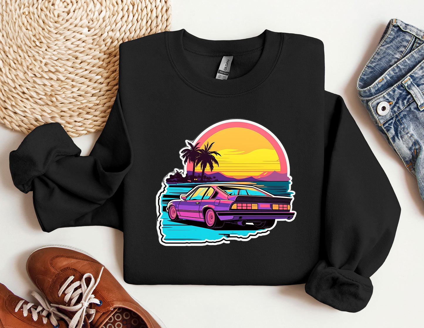 a black sweatshirt with a purple car and palm trees on it