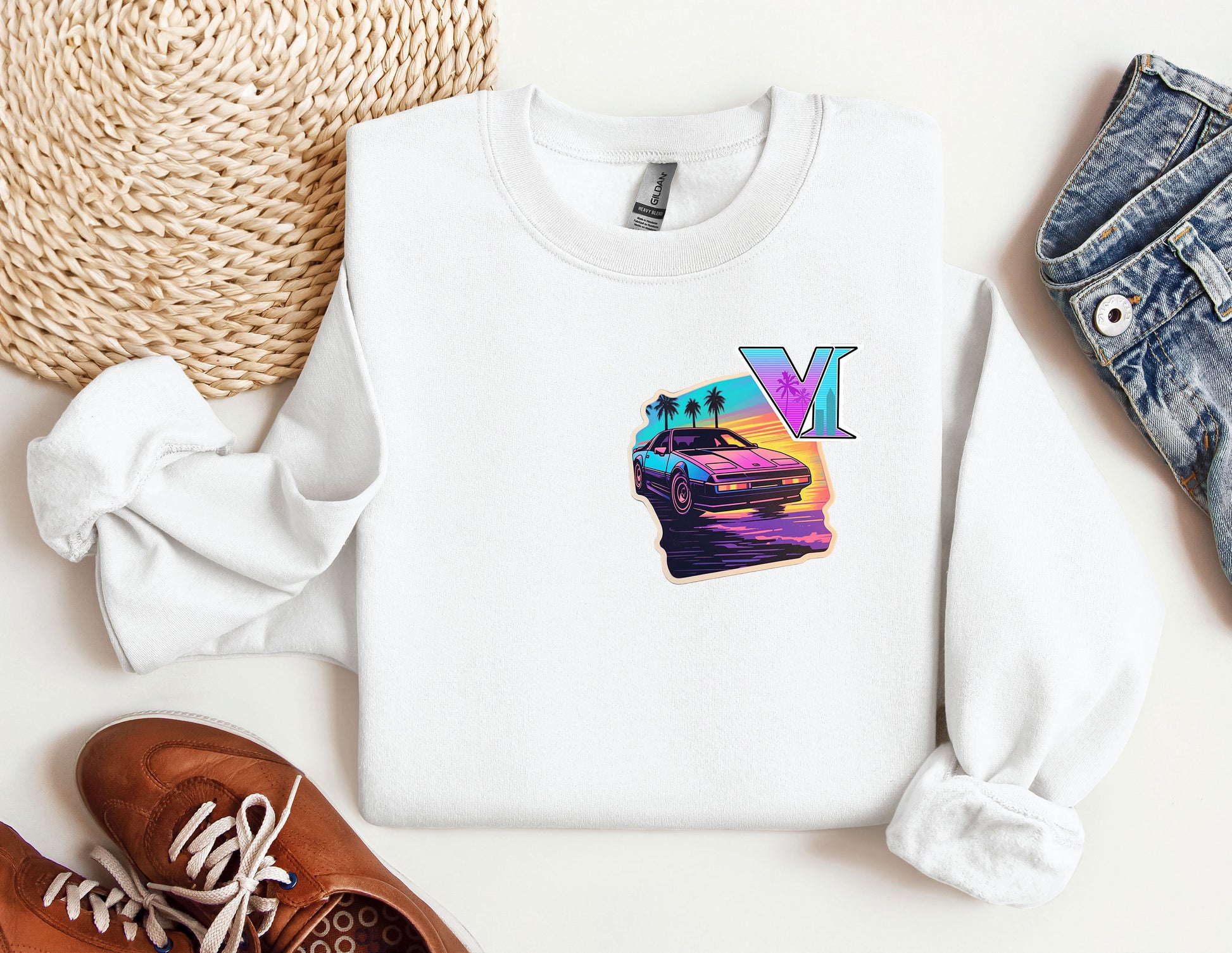 a white sweatshirt with a picture of a car on it