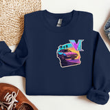 a blue sweatshirt with a v on it next to a pair of shoes
