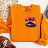 an orange shirt with a picture of a car on it
