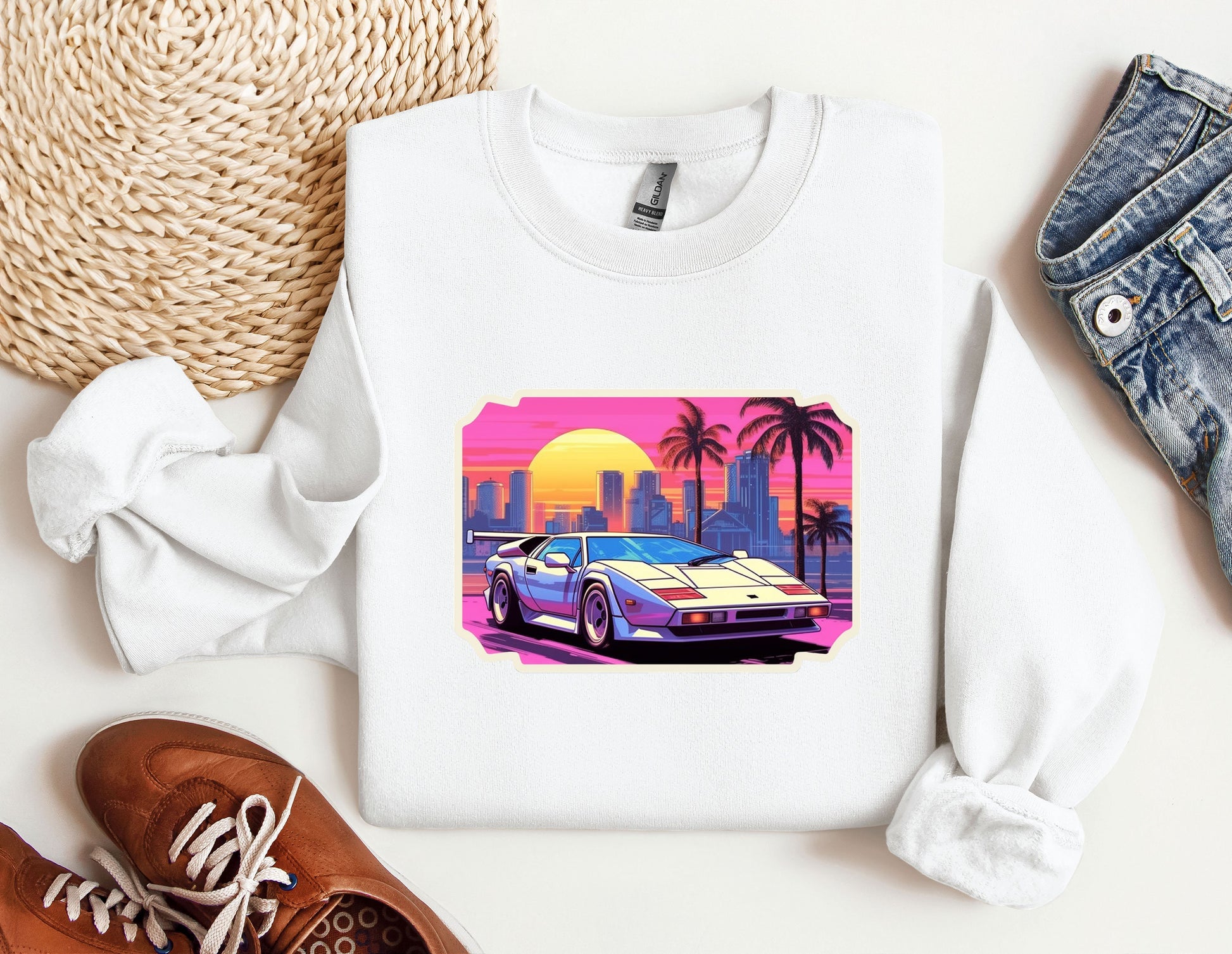 a white sweatshirt with a picture of a car on it