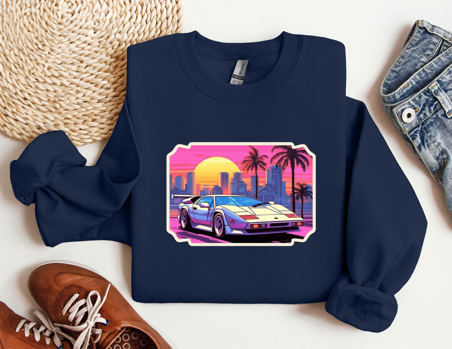 a blue sweatshirt with a picture of a car on it