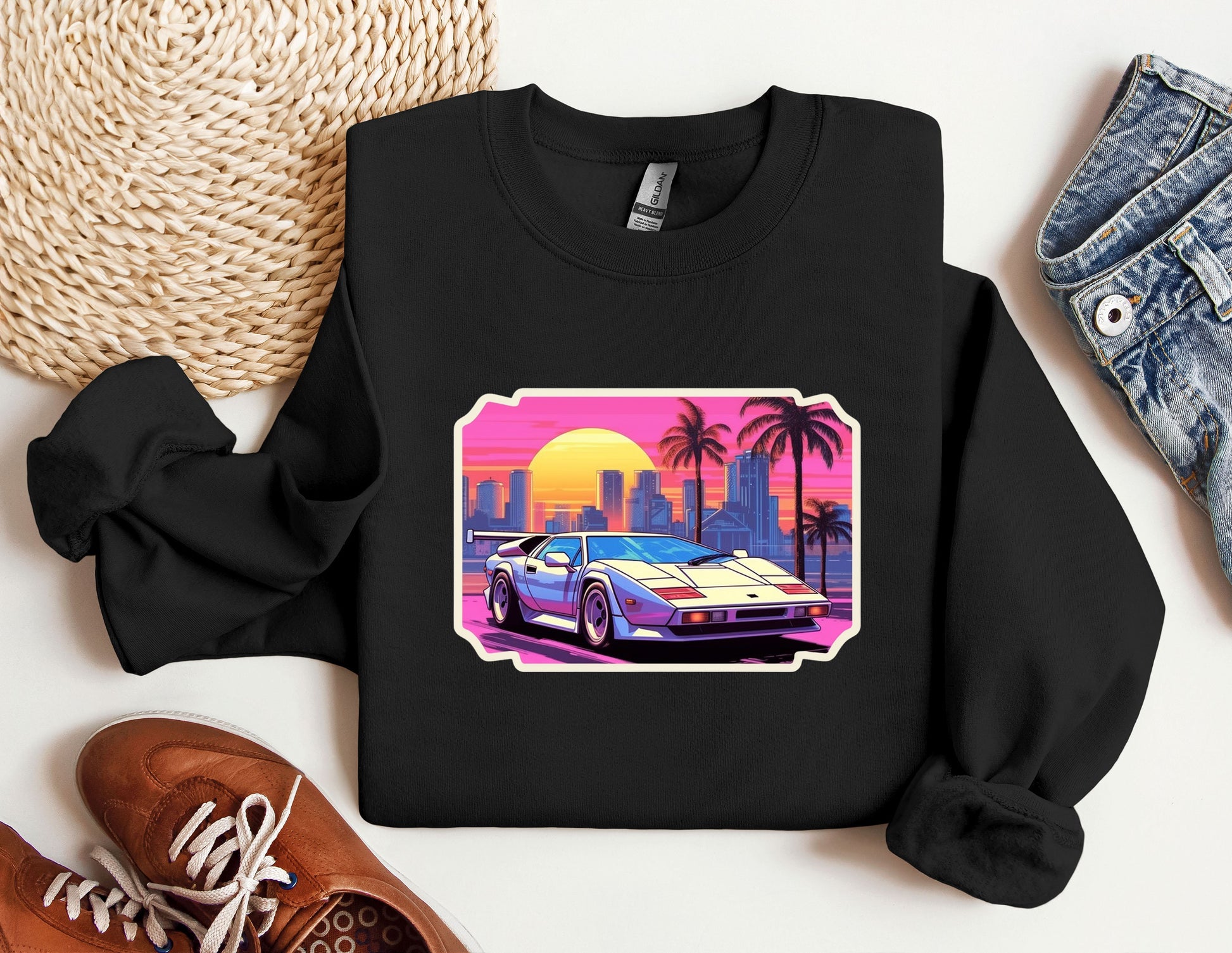 a black sweatshirt with a picture of a car on it