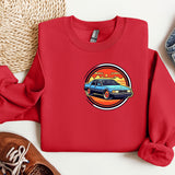 a red sweatshirt with a picture of a car on it