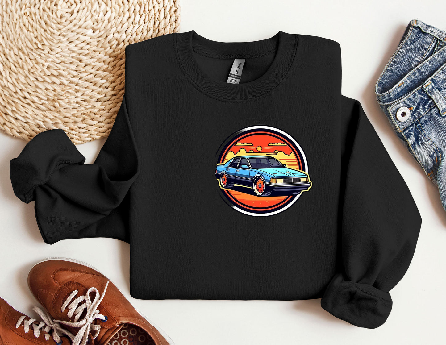 a black sweatshirt with a picture of a car on it