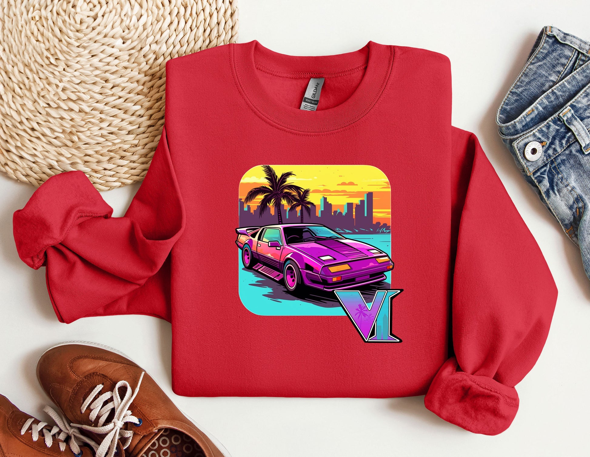 a red shirt with a picture of a car on it