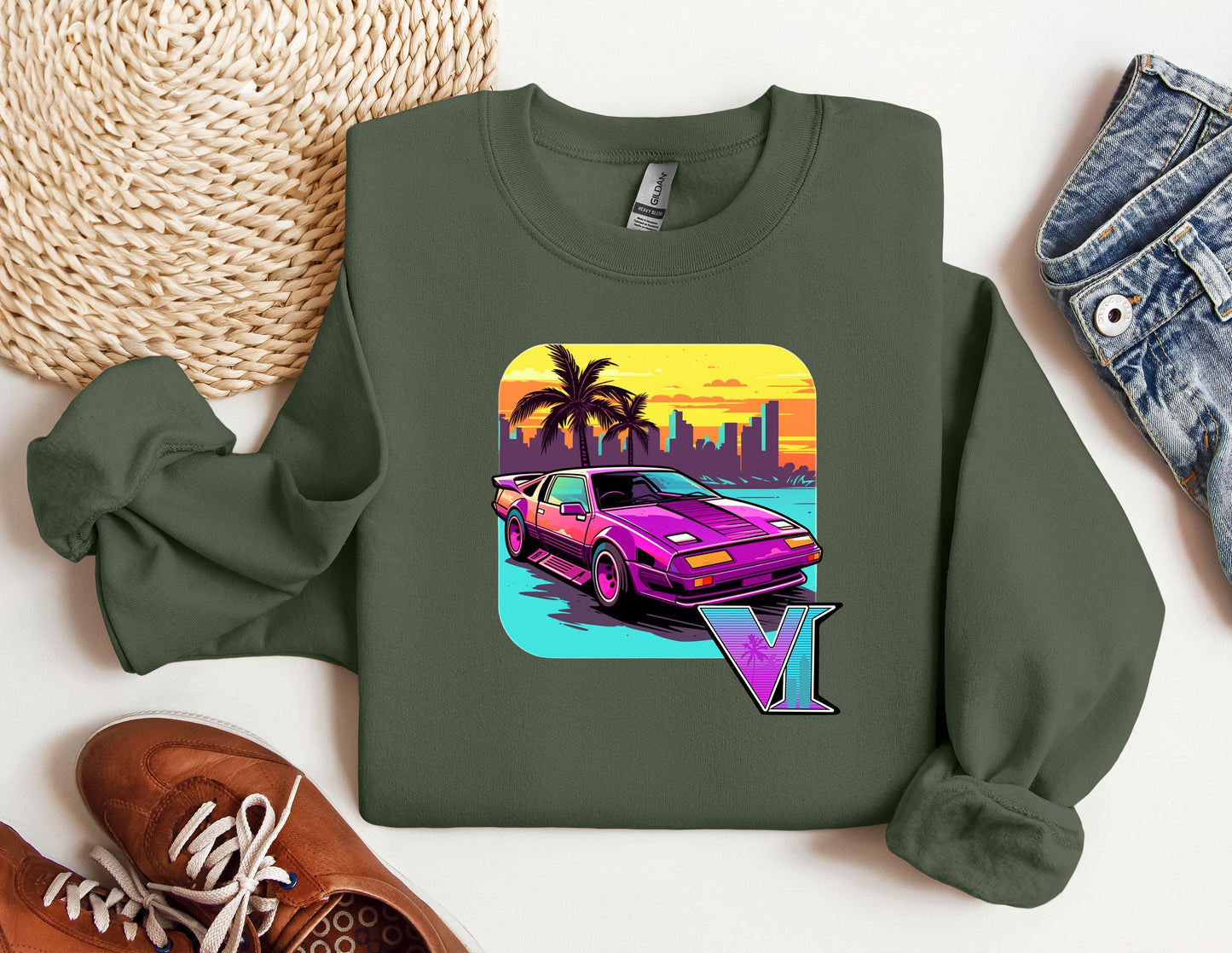 a green sweatshirt with a picture of a car on it