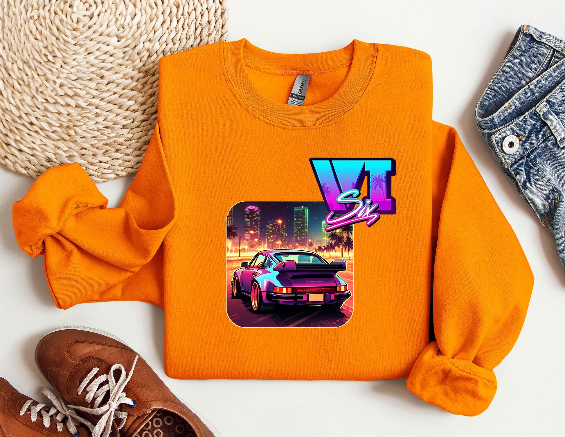 an orange shirt with a picture of a car on it