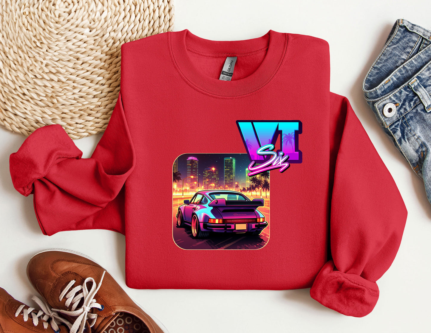 a red shirt with a picture of a car on it