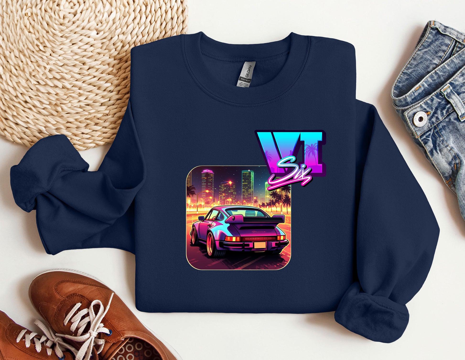 a blue sweatshirt with a picture of a car on it