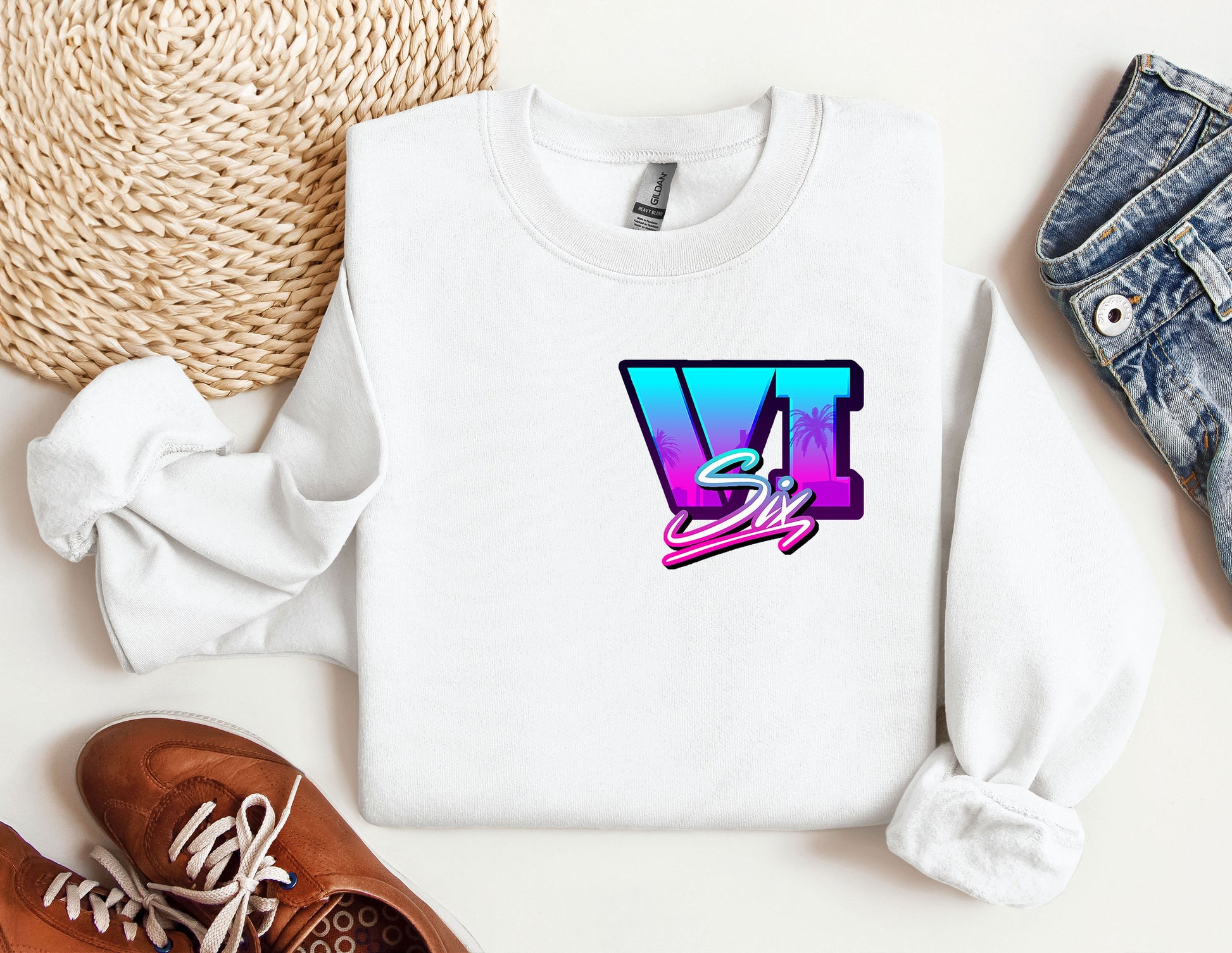 a white sweatshirt with the letter w on it