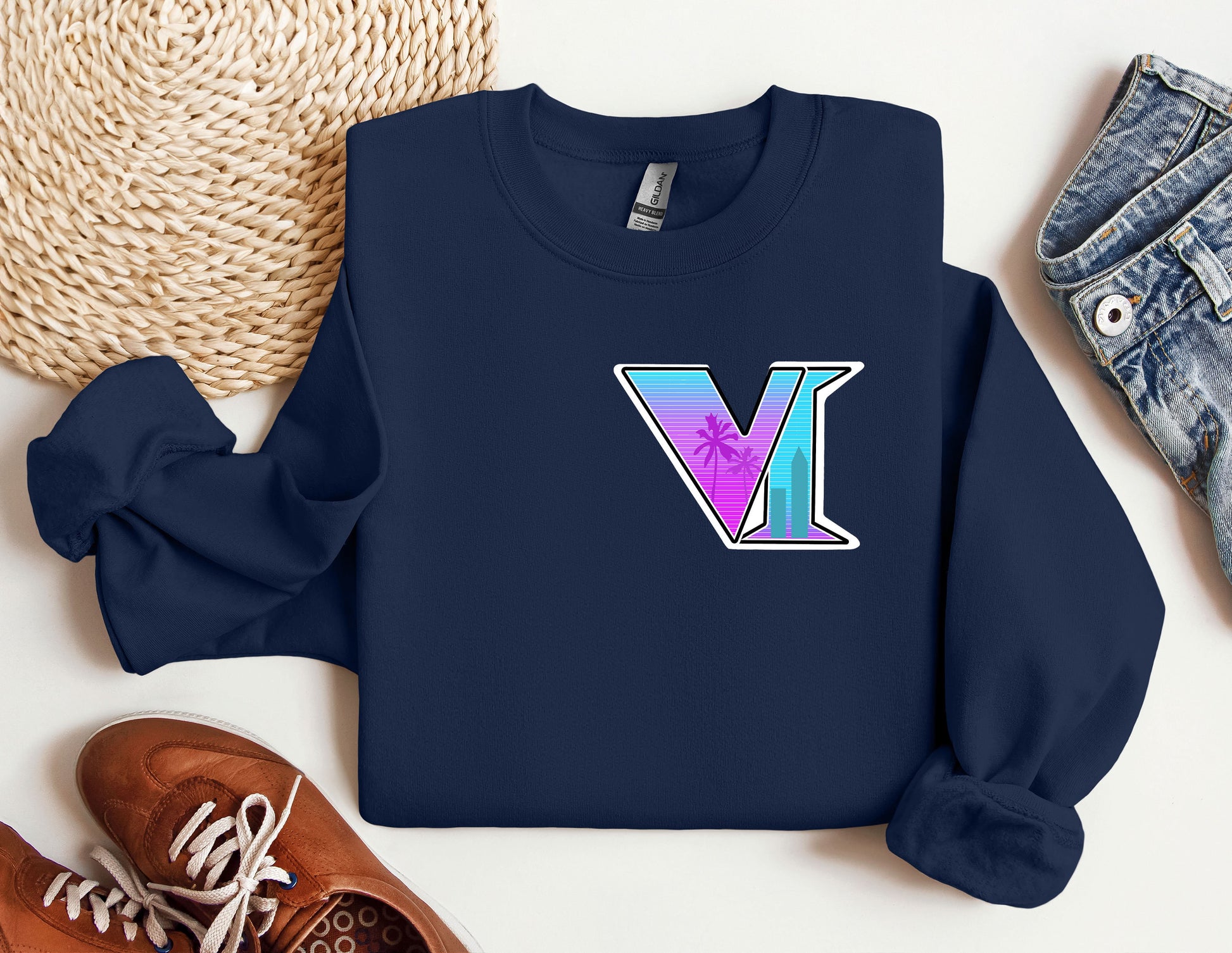 a blue sweatshirt with the letter v on it