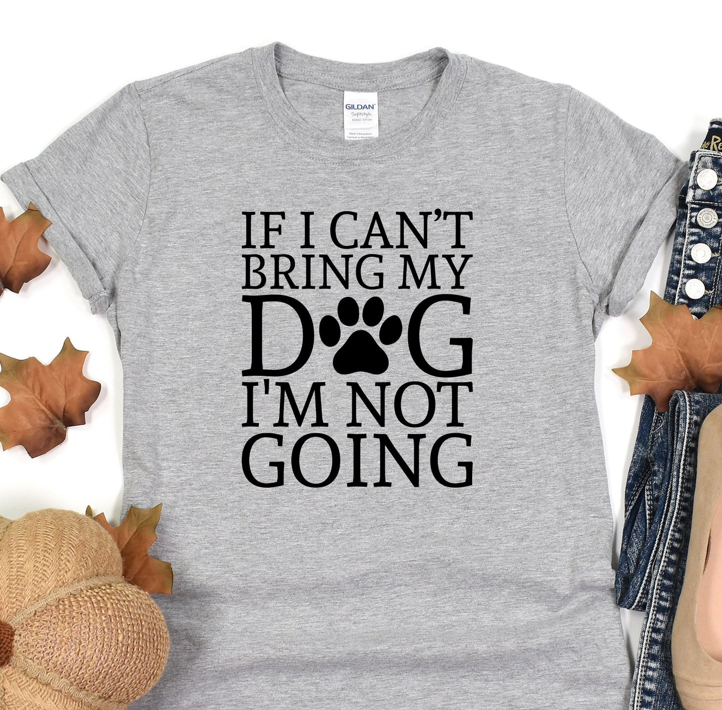 a t - shirt that says if i can&#39;t bring my dog i &#39;