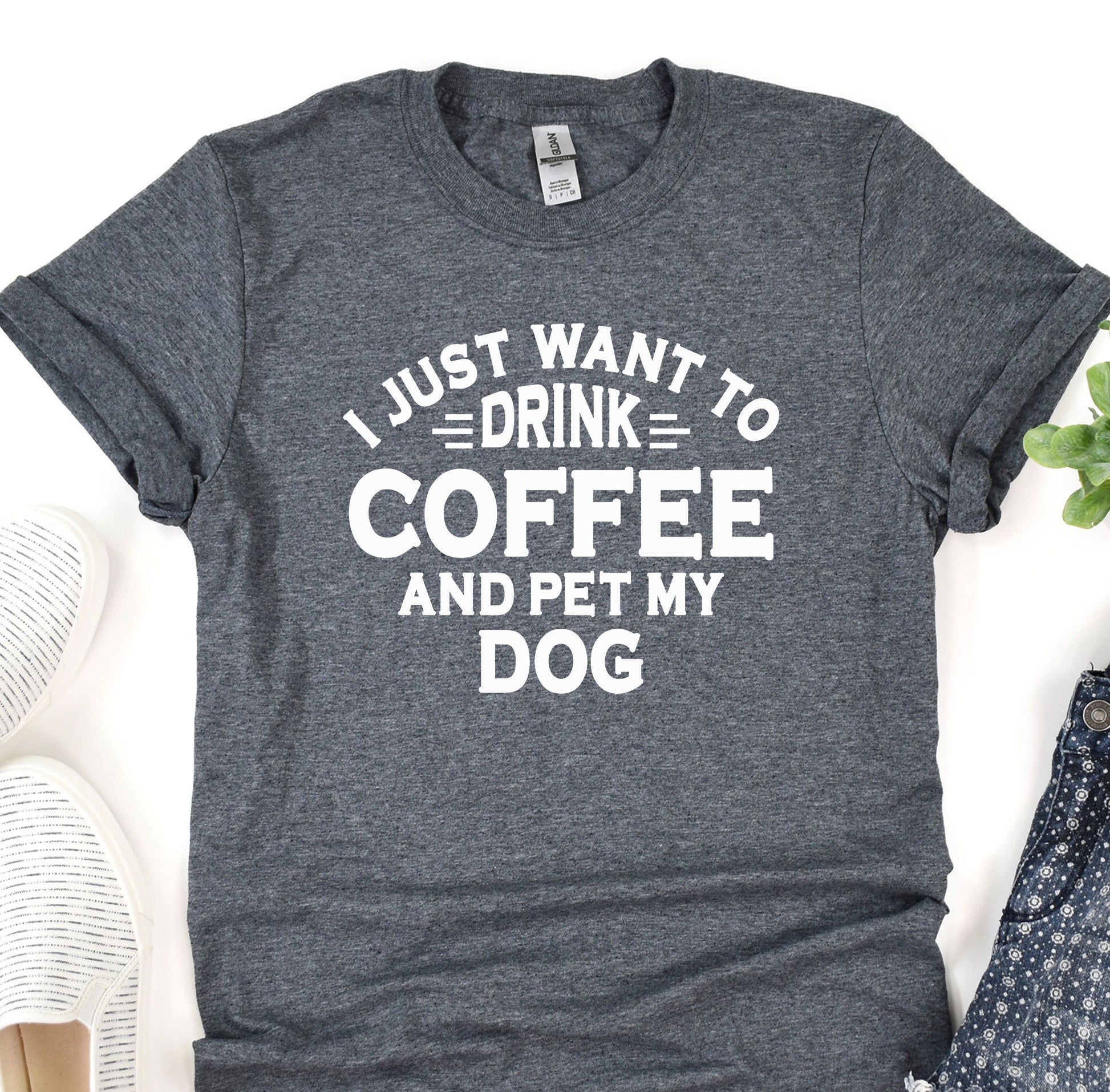 a t - shirt that says i just want to drink coffee and pet my dog