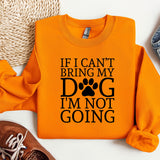 an orange shirt with a dog's paw on it