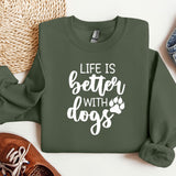 a green sweatshirt with the words life is better with dogs printed on it