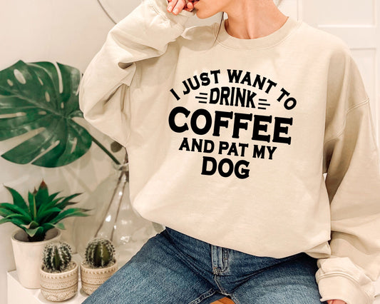 a woman wearing a sweatshirt that says i just want to drink coffee and pat my