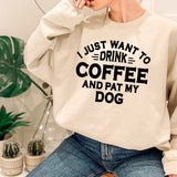 a woman wearing a sweatshirt that says i just want to drink coffee and pat my