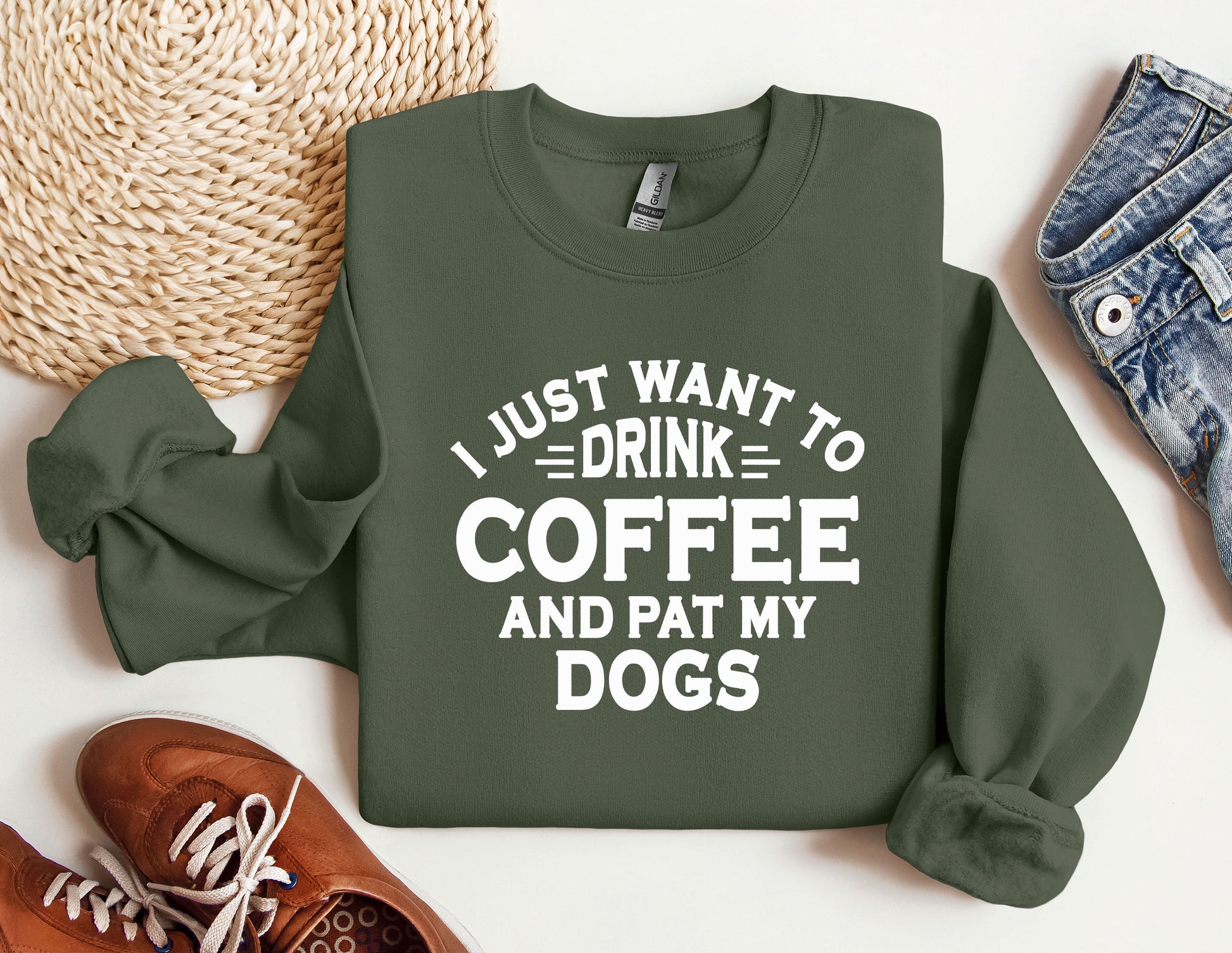 a sweatshirt that says i just want to drink coffee and pat my dogs