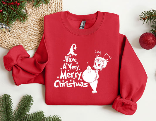 a red sweatshirt with a christmas message on it