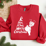 a red sweatshirt with a christmas message on it