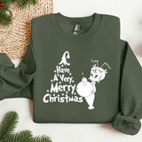 a green sweatshirt with a christmas message on it